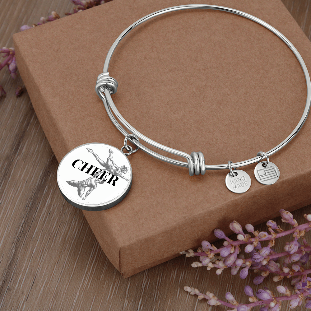 A bangle to dangle from your cheerleaders wrist.