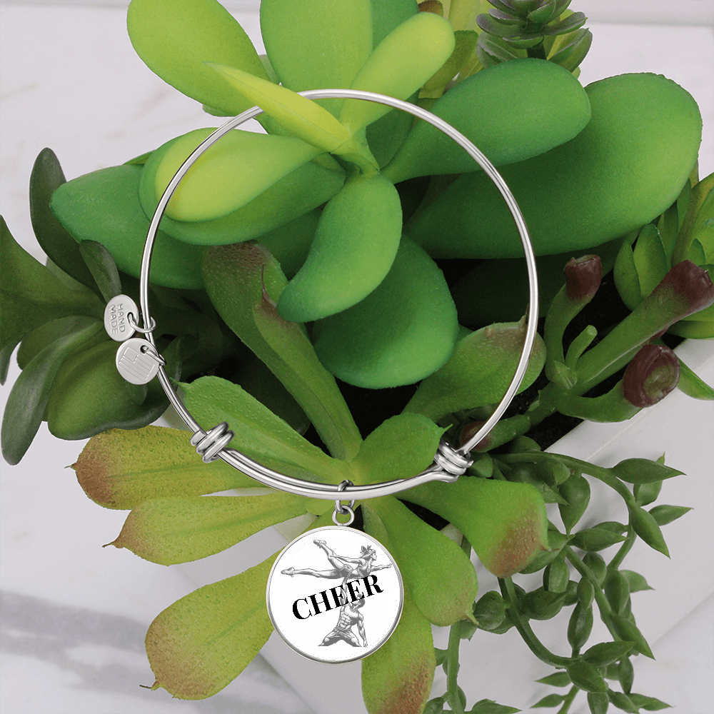 A bangle to dangle from your cheerleaders wrist.